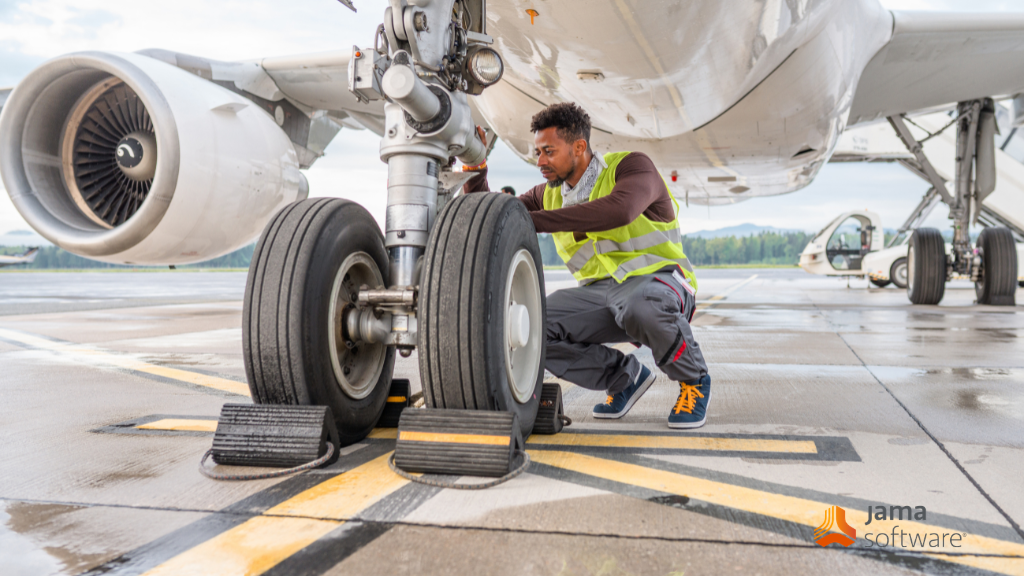 Commercial aircraft engineer on tarmac.